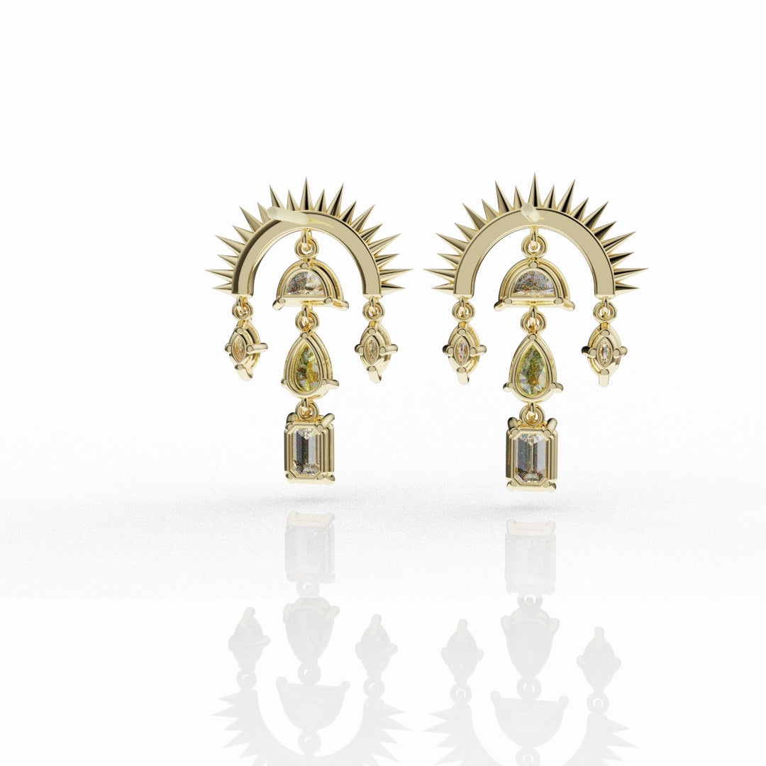 Statement sunburst earrings with pear-shaped yellow diamonds and white marquise diamonds in gold.