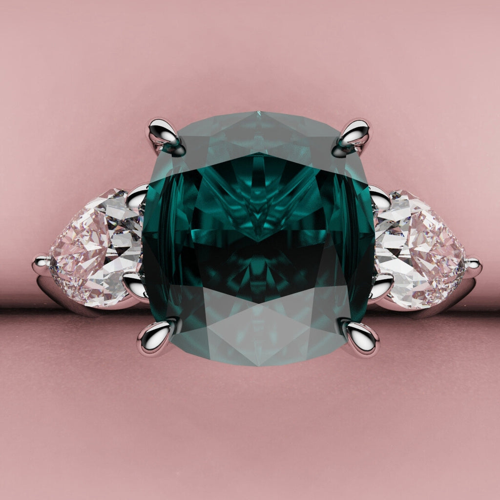 teal sapphire and diamond trilogy engagement ring 