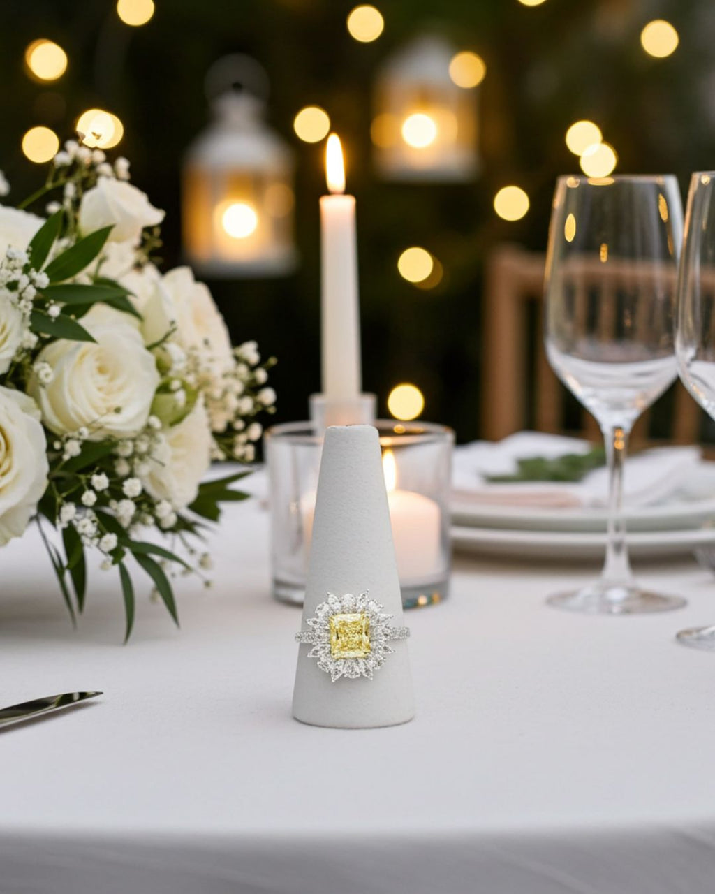 Fancy yellow radiant cut diamond engagement ring with pear and marquise diamond cluster halo in platinum — luxury bespoke design by Hyde Park Design.