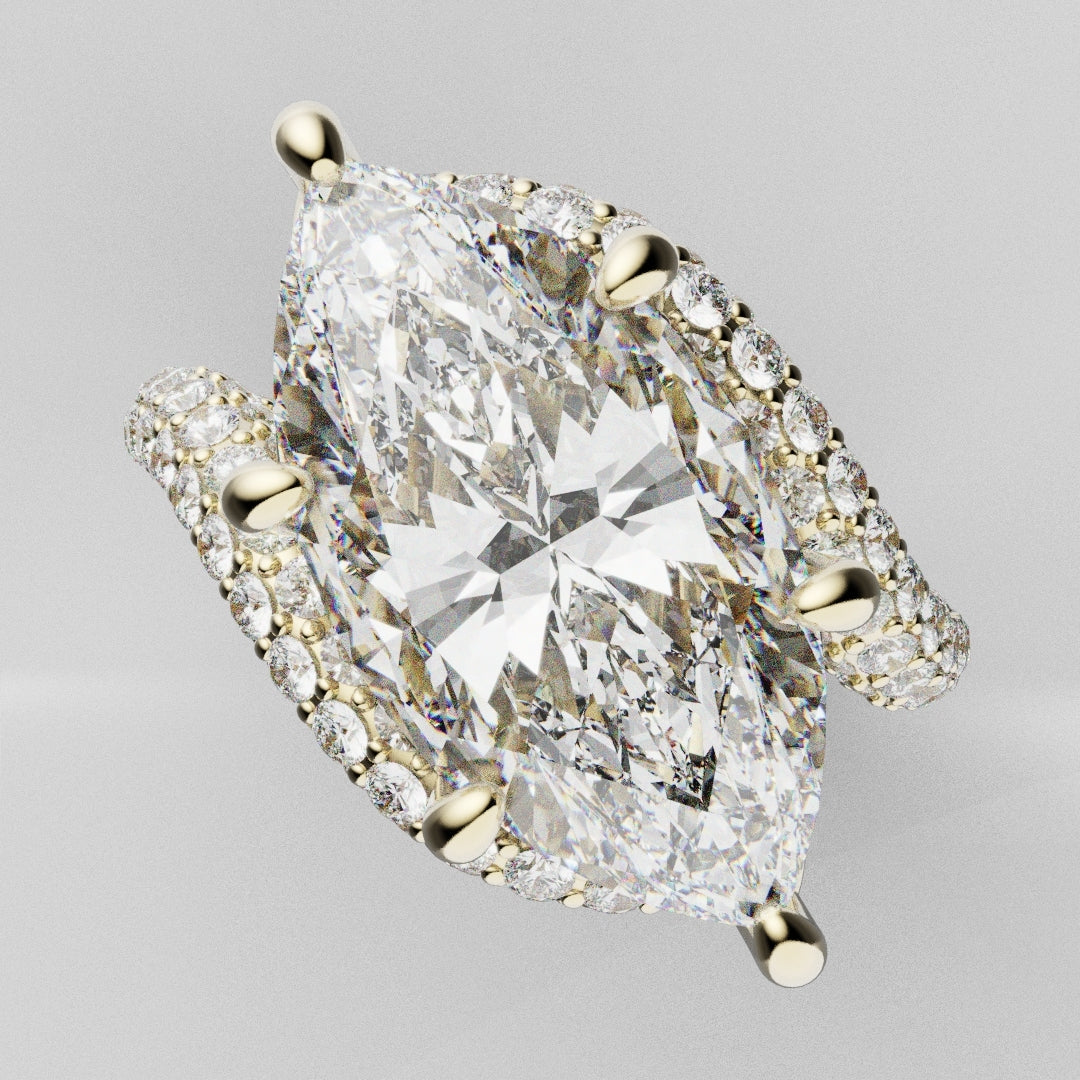 Bespoke 5ct marquise engagement ring with brilliant-cut pavé diamonds and yellow gold prongs, handmade in Hatton Garden.