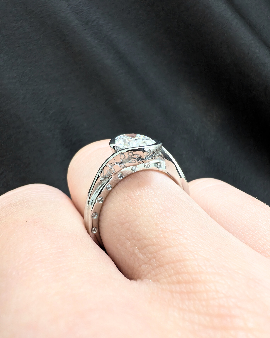 Flowing Vine Oval Diamond Engagement Ring with Hidden Diamonds