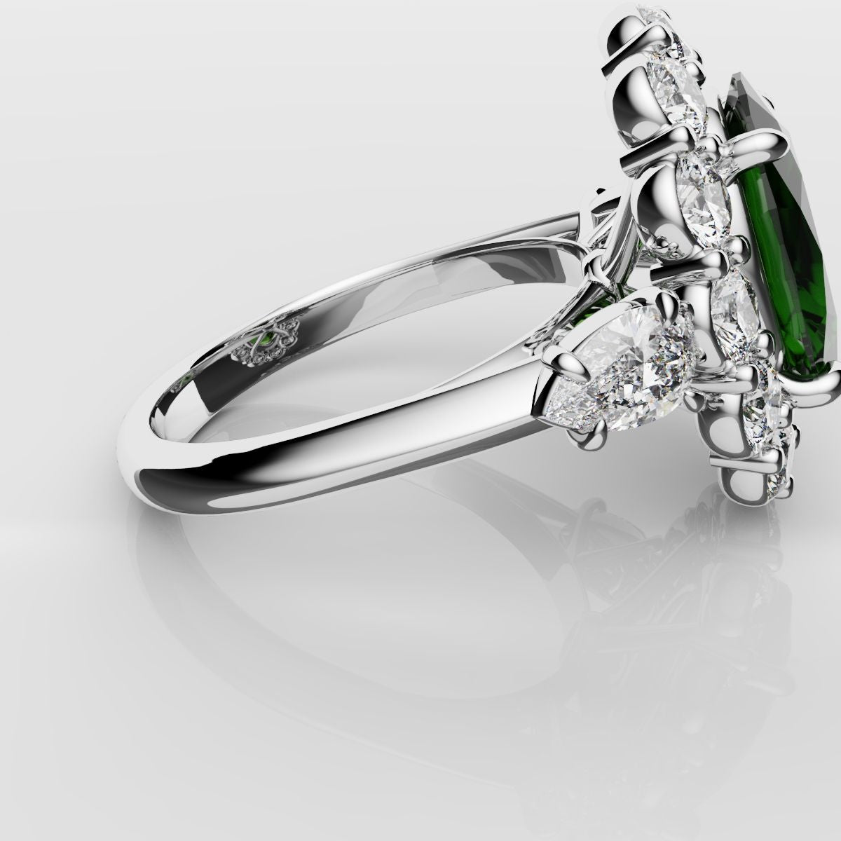Oval Emerald Cluster Engagement Ring With Pear Shoulder Diamonds