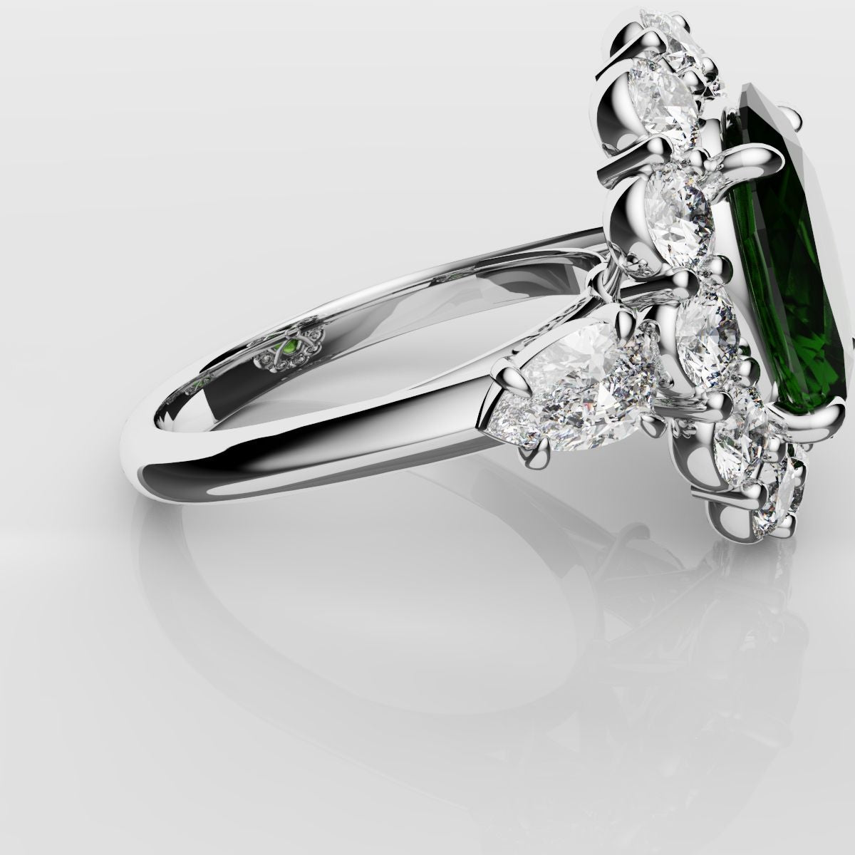 Oval Emerald Cluster Engagement Ring With Pear Shoulder Diamonds