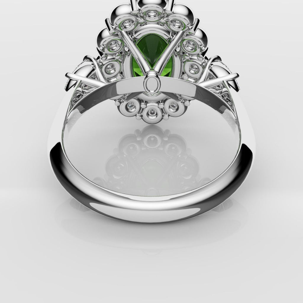 Oval Emerald Cluster Engagement Ring With Pear Shoulder Diamonds