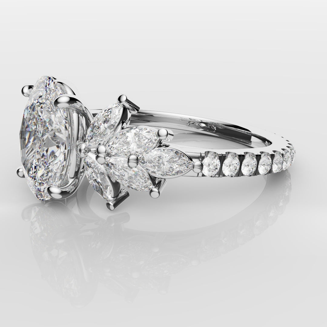 Oval Diamond Engagement Ring With Marquise Detailing