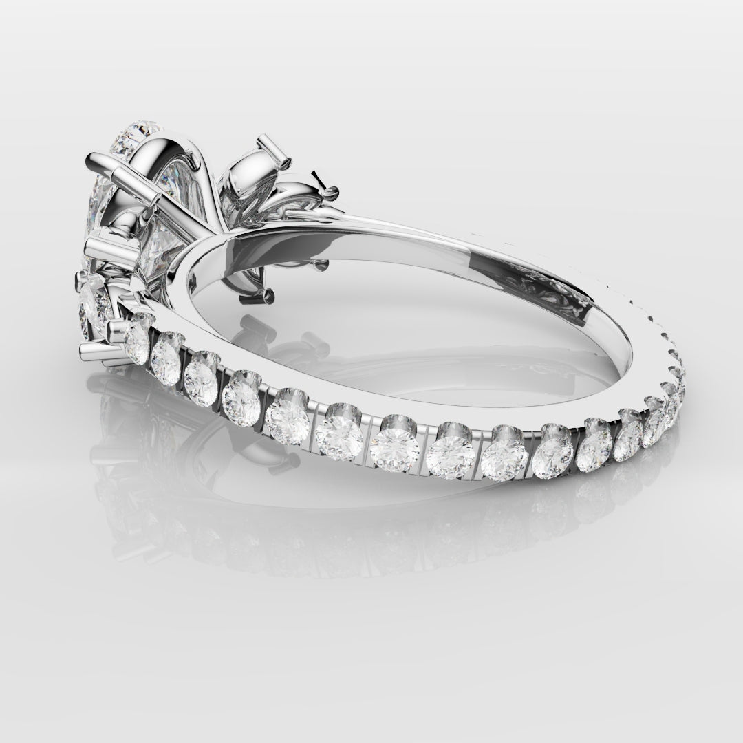 Oval Diamond Engagement Ring With Marquise Detailing