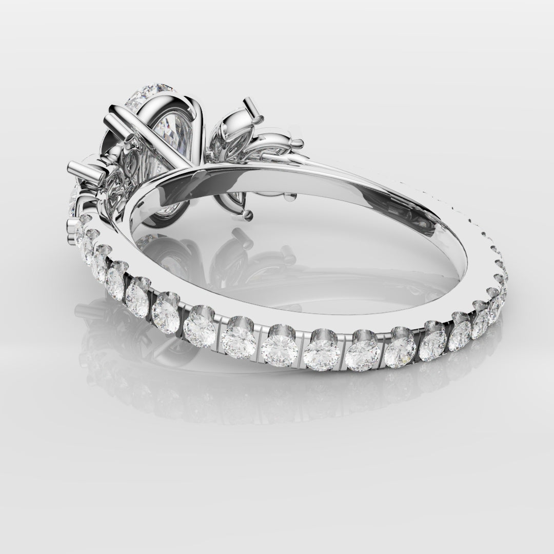 Oval Diamond Engagement Ring With Marquise Detailing
