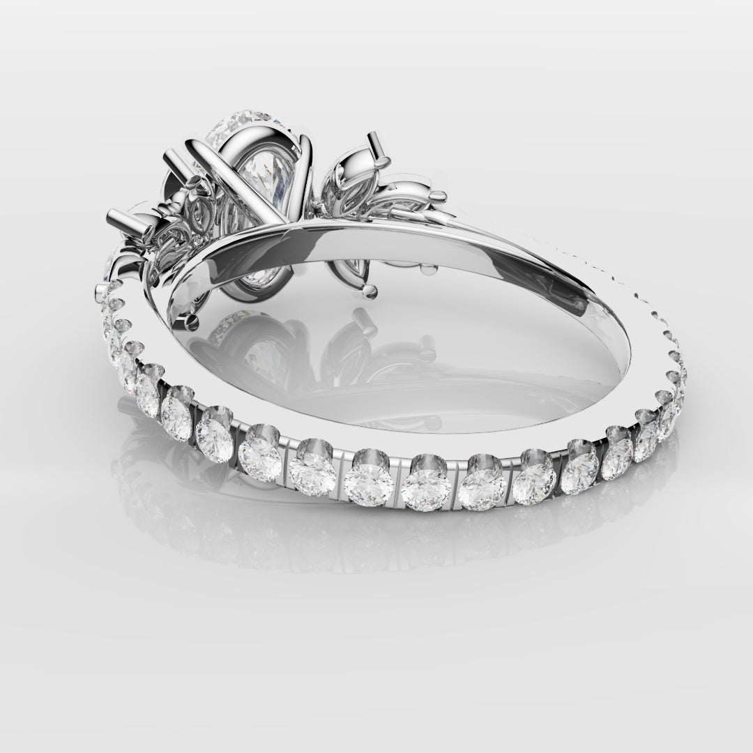 Oval Diamond Engagement Ring With Marquise Detailing