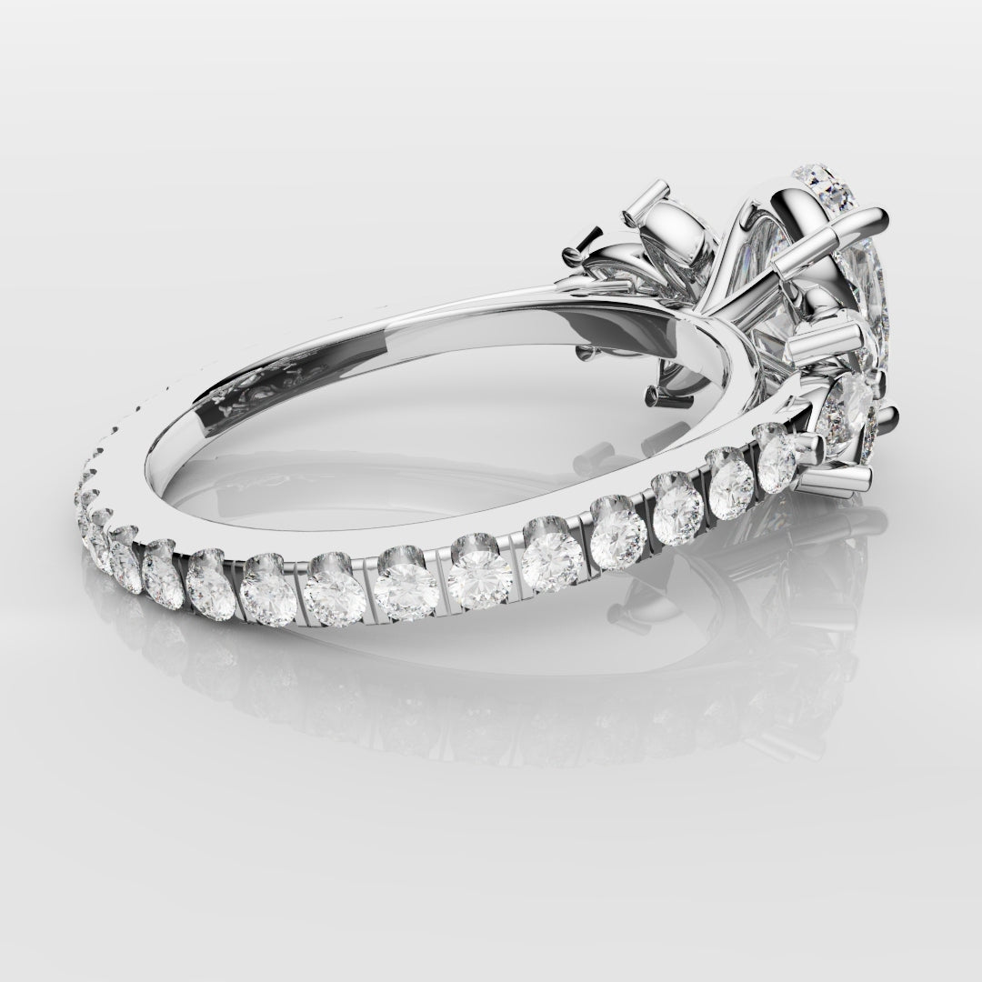 Oval Diamond Engagement Ring With Marquise Detailing