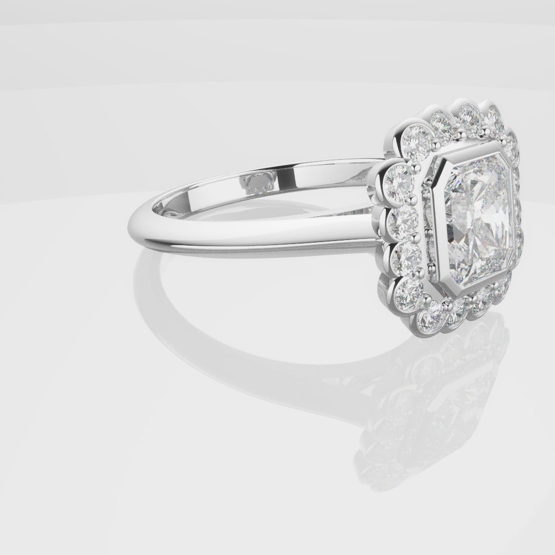 Radiant Cut Diamond Halo Engagement Ring With Rub-over Setting