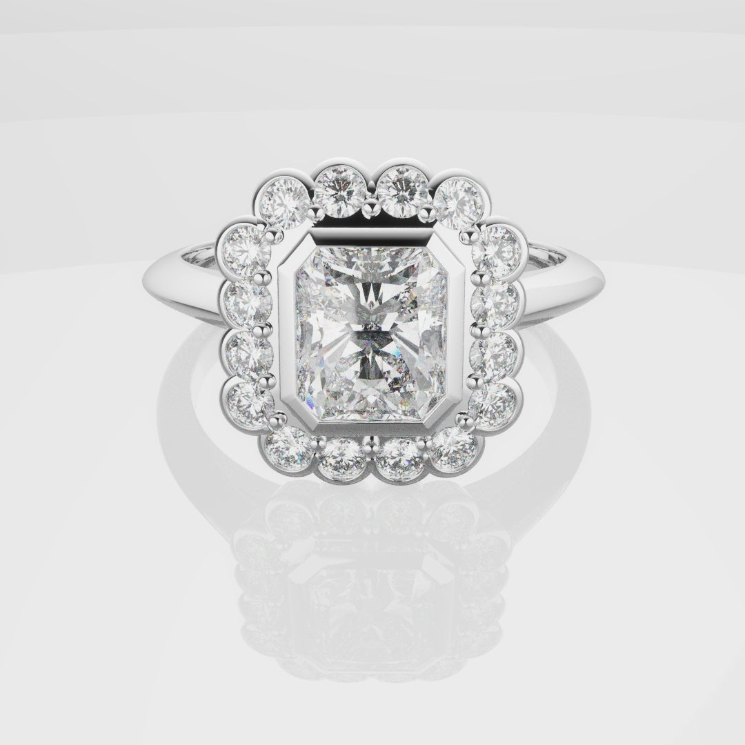 Radiant Cut Diamond Halo Engagement Ring With Rub-over Setting
