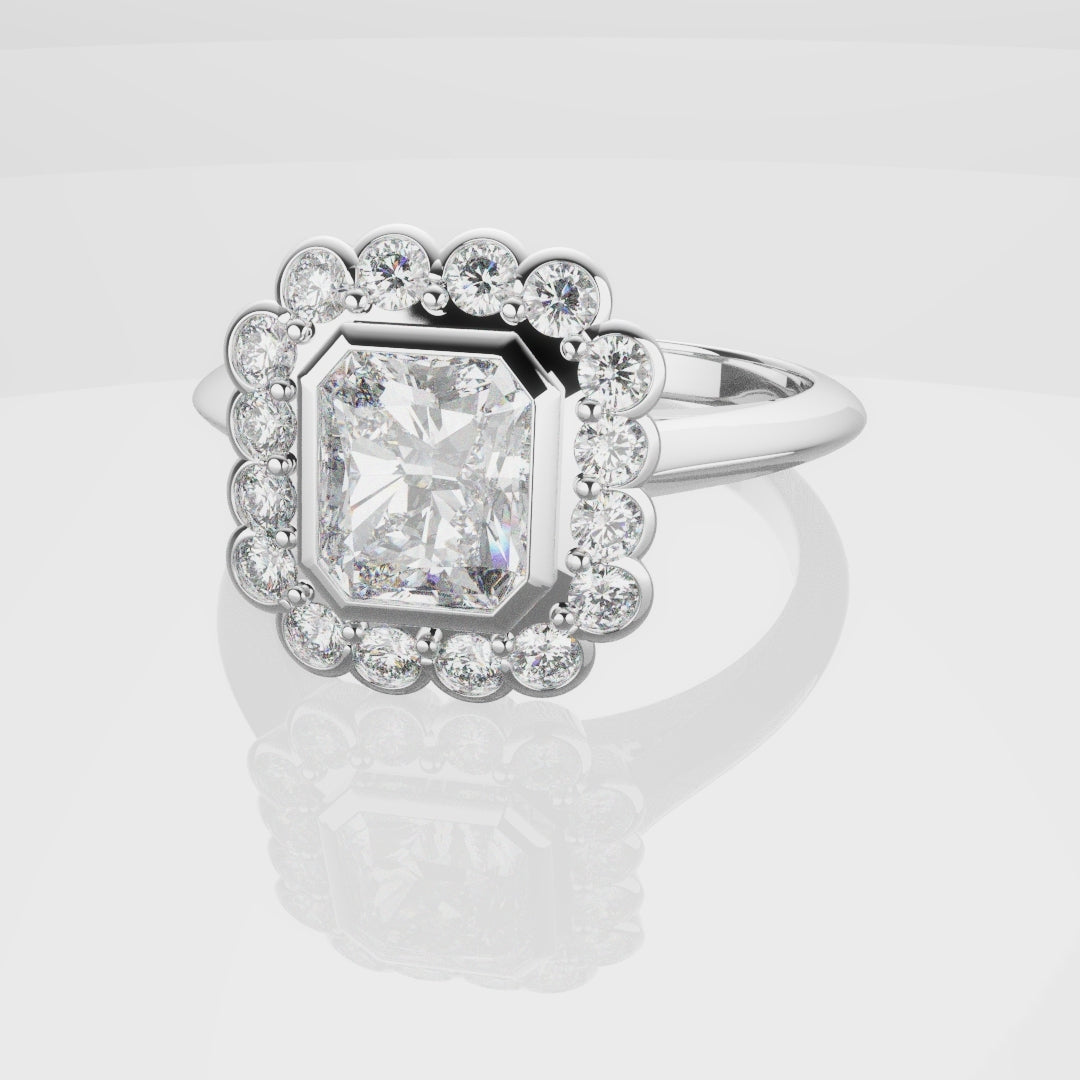 Radiant Cut Diamond Halo Engagement Ring With Rub-over Setting