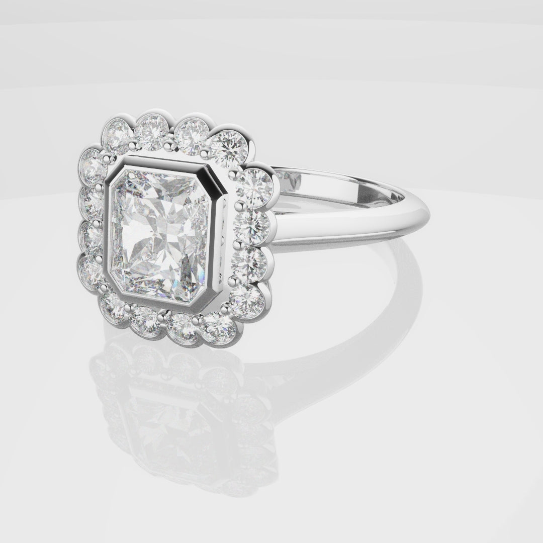 Radiant Cut Diamond Halo Engagement Ring With Rub-over Setting
