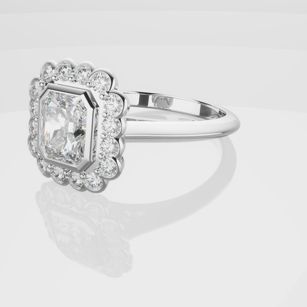 Radiant Cut Diamond Halo Engagement Ring With Rub-over Setting