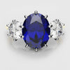 Ceylon Blue Sapphire and Cushion Cut Diamond Trilogy Engagement Ring