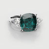 teal sapphire and diamond trilogy engagement ring 