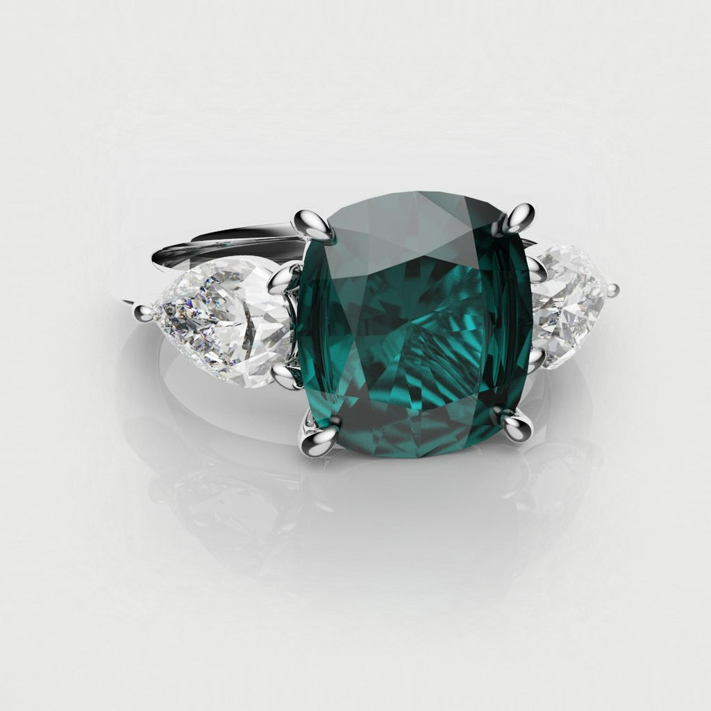 teal sapphire and diamond trilogy engagement ring 