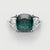 cushion cut teal sapphire triligy engagement ring