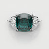 cushion cut teal sapphire triligy engagement ring