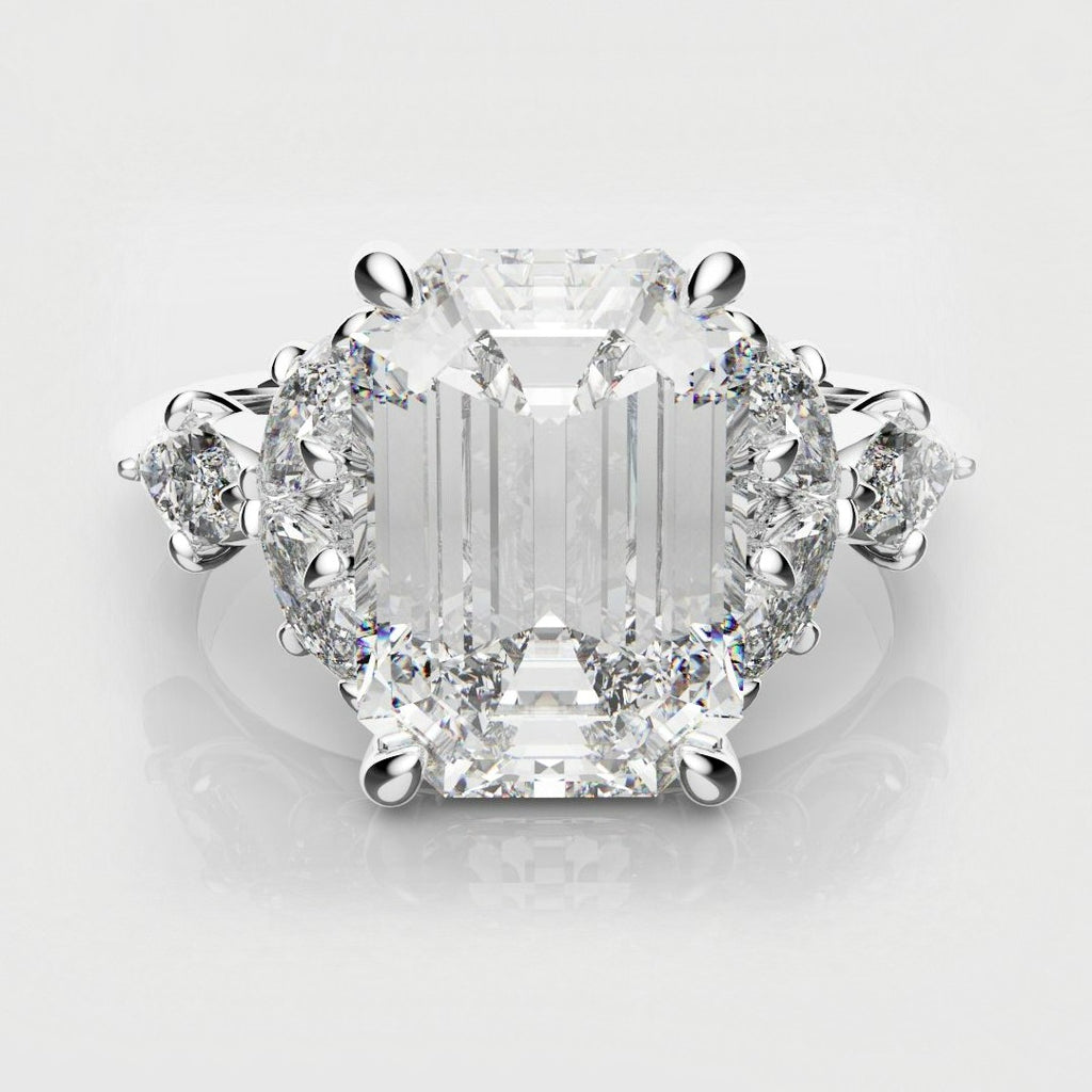 2ct emerald cut diamond with marquise cannet shoulders