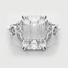 2ct emerald cut diamond with marquise cannet shoulders