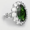 oval emerald cluster engagement ring