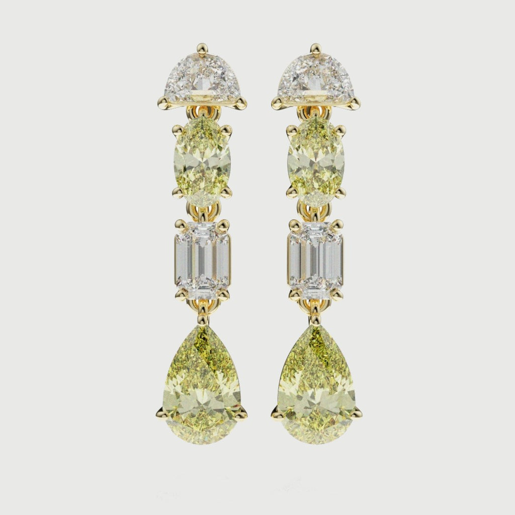 High jewellery drop earrings featuring natural fancy yellow diamonds in pear, oval and emerald cuts set in 18ct yellow gold.