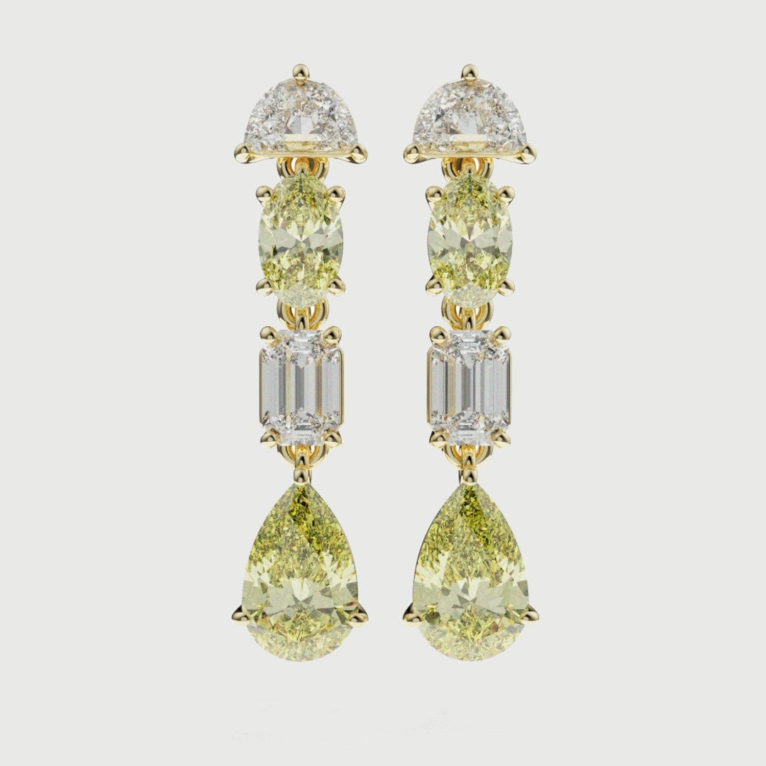 High jewellery drop earrings featuring natural fancy yellow diamonds in pear, oval and emerald cuts set in 18ct yellow gold.