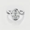 Flowing Vine Oval Diamond Engagement Ring with Hidden Diamonds