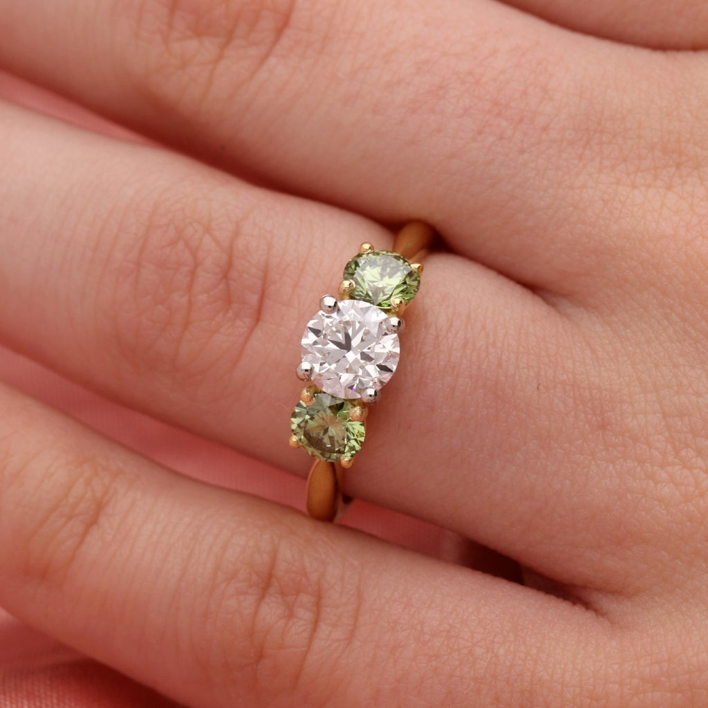 Three Stone Engagement Ring With Green Shoulder Diamonds