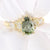 pear shaped green diamond ring