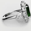 Oval Emerald Cluster Engagement Ring With Pear Shoulder Diamonds