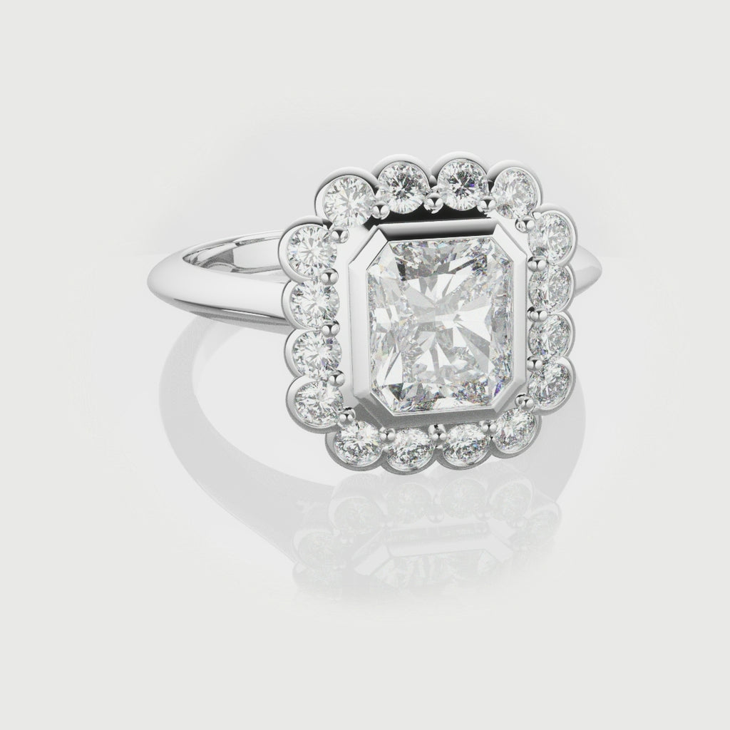 Radiant Cut Diamond Halo Engagement Ring With Rub-over Setting