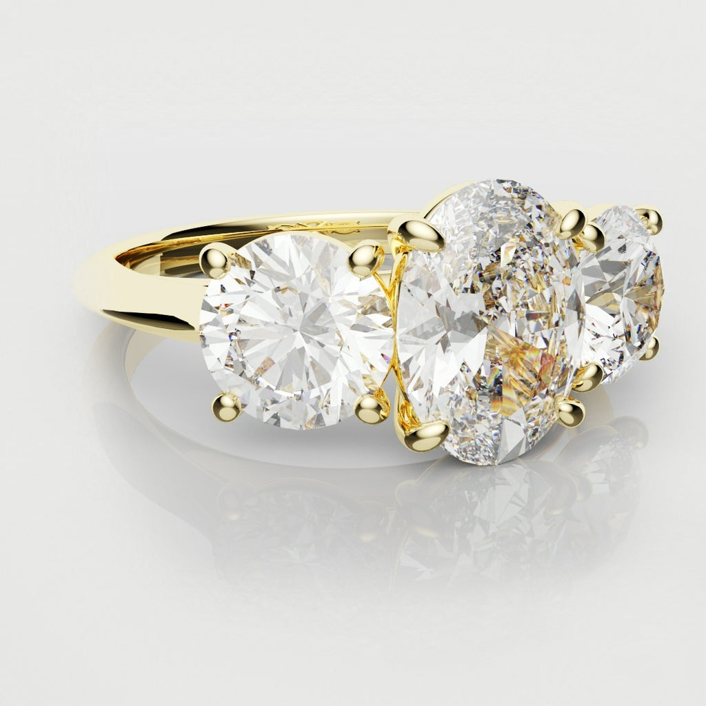 Oval Trilogy With Round Brilliant Cut Shoulder Diamonds