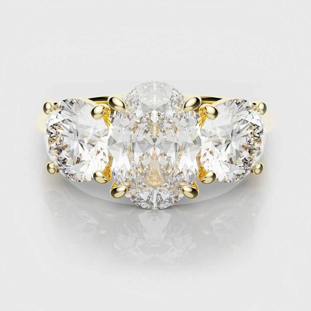 Oval Trilogy With Round Brilliant Cut Shoulder Diamonds