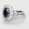 oval blue sapphire cluster engagement ring 