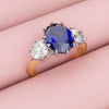 blue sapphire and diamond three stone engagement ring