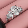 Oval Diamond Engagement Ring With Marquise Detailing