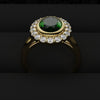 oval green emerald halo engagement ring