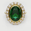 oval green emerald engagement ring