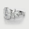 Oval Diamond Engagement Ring With Marquise Detailing