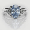 Fancy blue oval diamond engagement ring