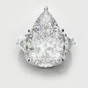 pear and trilliant diamond three stone engagemenrt ring