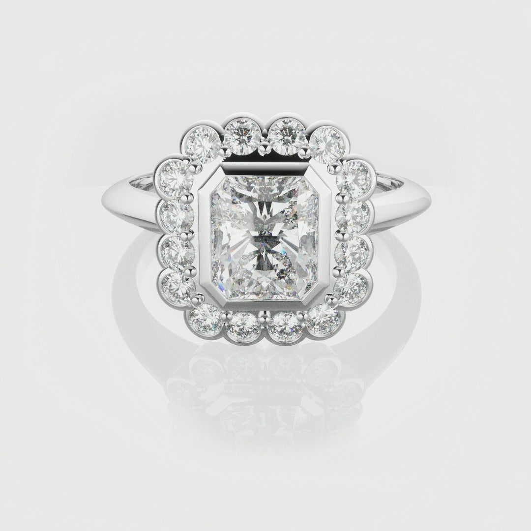 Radiant Cut Diamond Halo Engagement Ring With Rub-over Setting