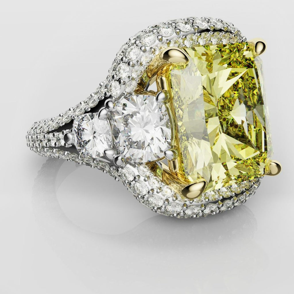 Fancy Yellow Radiant Cut Diamond with a Platinum Three Row Pavé Setting