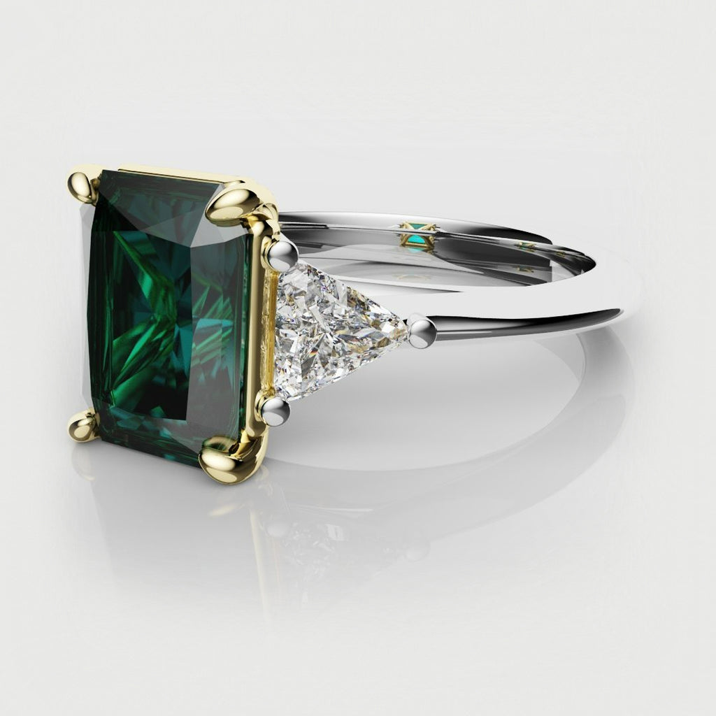 teal sapphire and trilliant diamond three stone engagement ring 