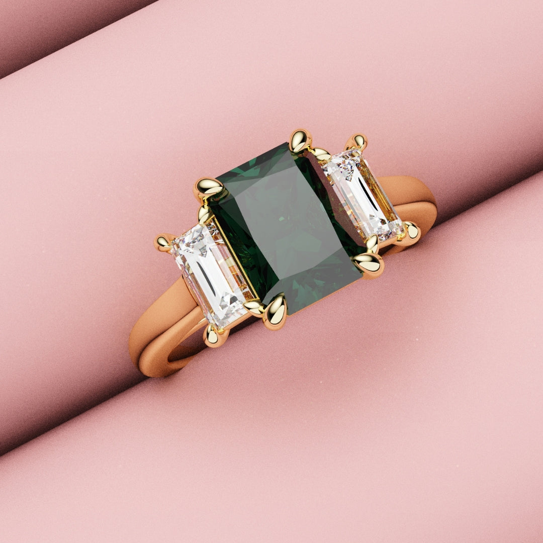 radiant cut teal sapphire and baguette diamond engagement ring 
