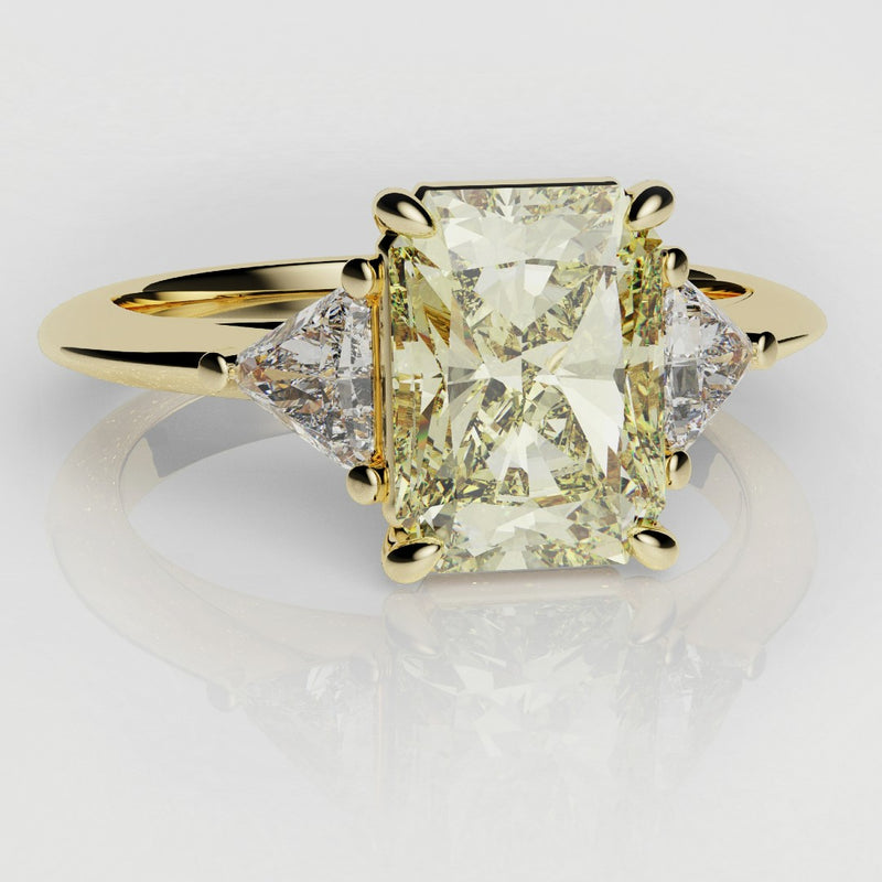 radiant cut yellow diamond three stone engagement ring