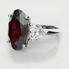 oval ruby and heart diamond three stone engagement ring 