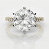 tulip set round brilliant cut diamon engagement ring